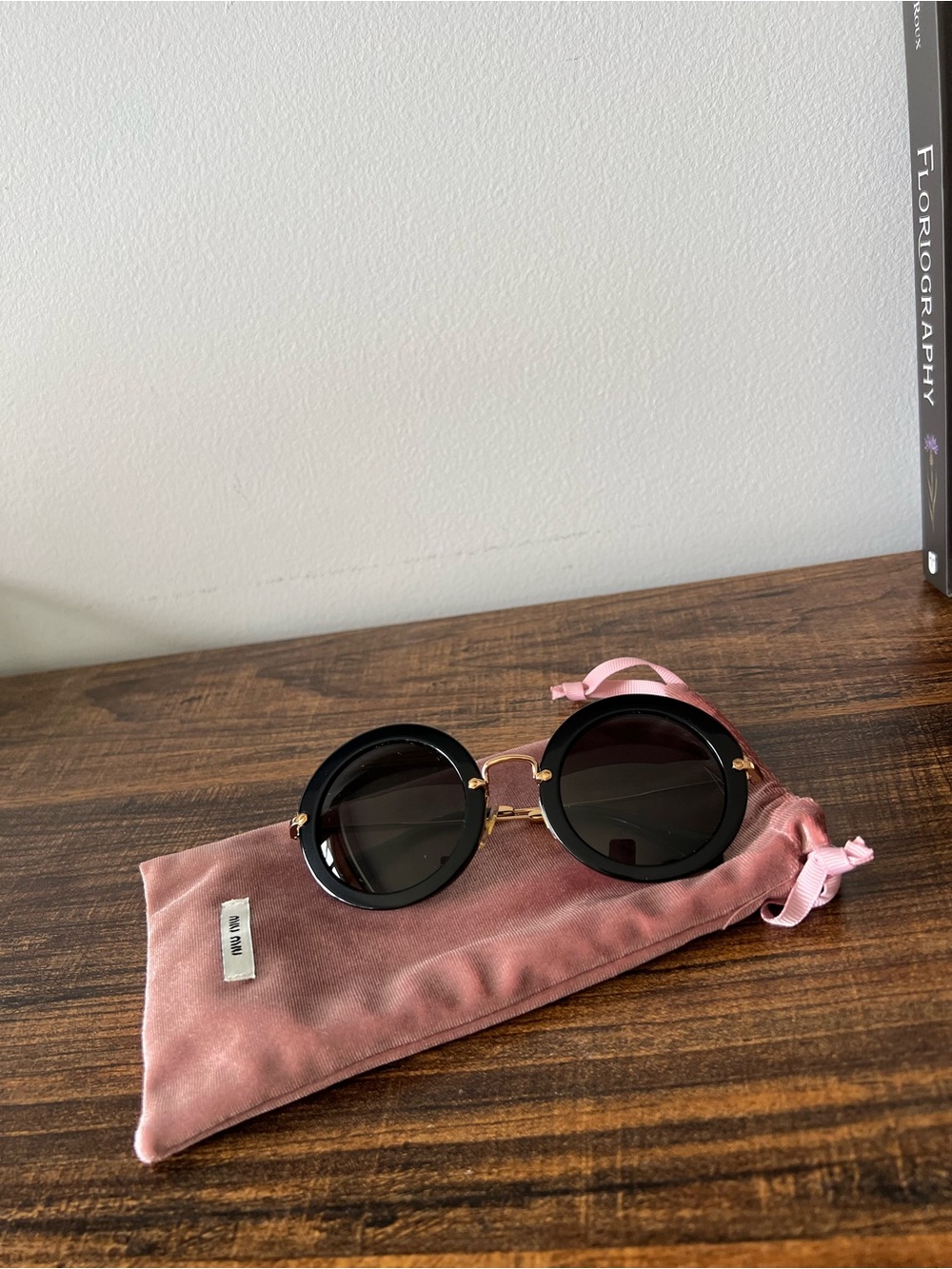 Miu Miu Round Black Frame Sunglasses with Pink Velvet Pouch
